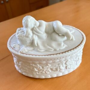 Belleek porcelain trinket box with sleeping cherub